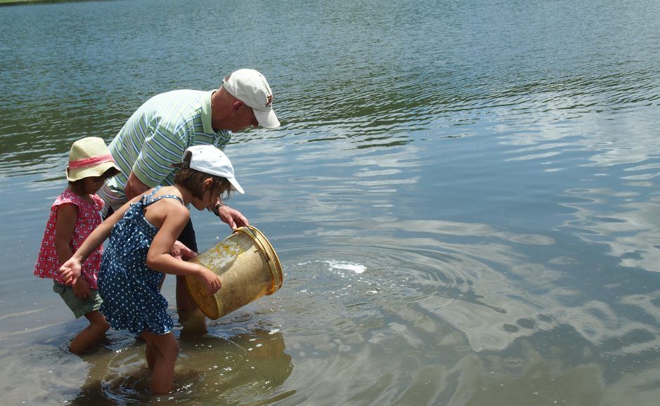 Young helpers Amelia and Rose Ramia helping Peter Taylor this week restock Cressbrook Dam with fingerlings. Young helpers Amelia and Rose Ramia helping Peter Taylor this week restock Cressbrook Dam with fingerlings.