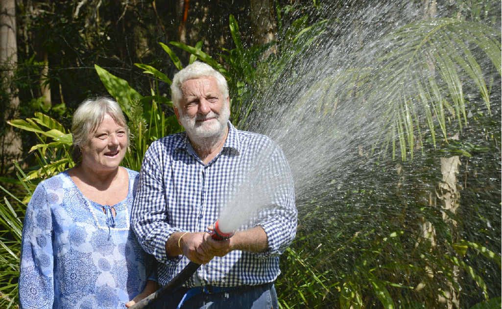 Helen and Ross Pye of Ashby with a hose run from their own fire-fighting pump. Photo: Adam Hourigan Helen and Ross Pye of Ashby with a hose run from their own fire-fighting pump. Photo: Adam Hourigan