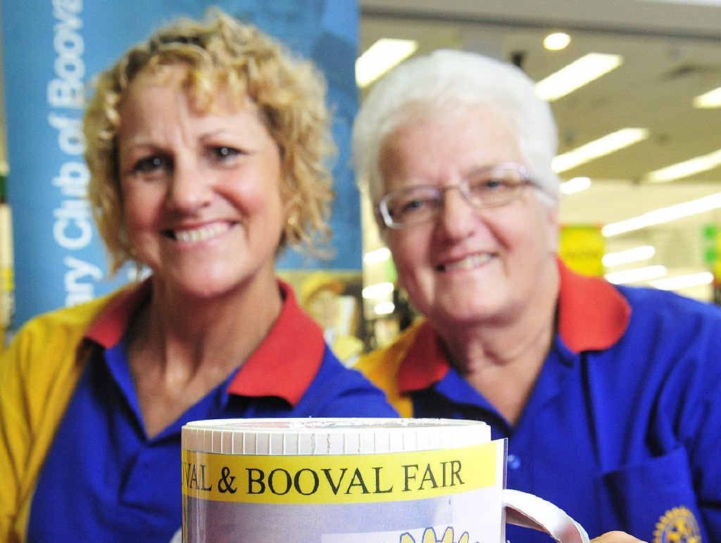 FOR THOSE IN NEED: Booval Rotary member Glennis Bentley (left) and helper Julia Keidge collect donations at Booval Fair for families affected by the bushfires. FOR THOSE IN NEED: Booval Rotary member Glennis Bentley (left) and helper Julia Keidge collect donations at Booval Fair for families affected by the bushfires.