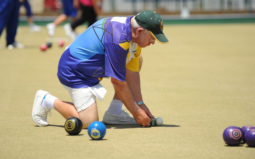 SO CLOSE: Dusko Zobenica measures for the shot during a bowls match between the Burnett Bowls Club and Hervey Bay. Photo: Mike Knott / NewsMail SO CLOSE: Dusko Zobenica measures for the shot during a bowls match between the Burnett Bowls Club and Hervey Bay. Photo: Mike Knott / NewsMail