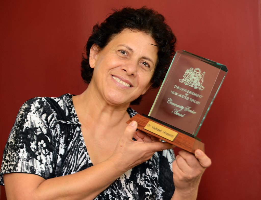 WELL-DESERVED: Dr Vahideh Hosseini with her Premier’s Award for her work with the Red Cross and, below, students of Dr Hosseini at Unital University. bottom, a daily class of 50 young children that she also educates. WELL-DESERVED: Dr Vahideh Hosseini with her Premier’s Award for her work with the Red Cross and, below, students of Dr Hosseini at Unital University. bottom, a daily class of 50 young children that she also educates.
