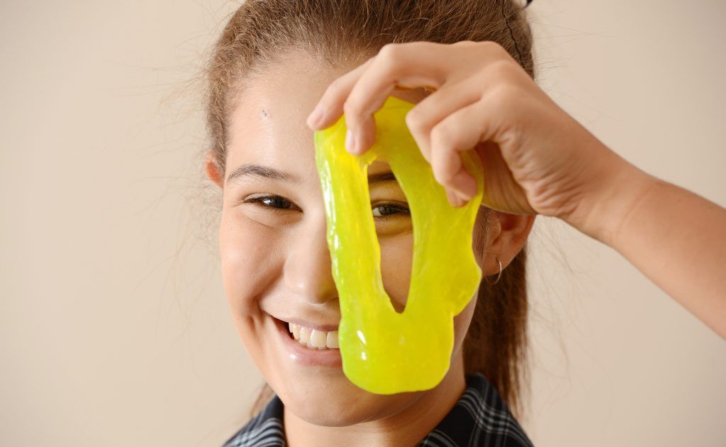 16 year old Lauren Booth with some green slime that she made at the ANU Chemistry Lab in Canberra at a National Science Forum. 16 year old Lauren Booth with some green slime that she made at the ANU Chemistry Lab in Canberra at a National Science Forum.