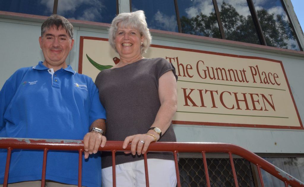 OPEN ARMS: Gumnut Place employee Chris Thompson with Nina Temperton. OPEN ARMS: Gumnut Place employee Chris Thompson with Nina Temperton.