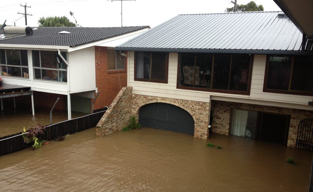 Homes along Tweed Valley Way, as you enter Murwillumbah, have been inundated with flood waters. Homes along Tweed Valley Way, as you enter Murwillumbah, have been inundated with flood waters.