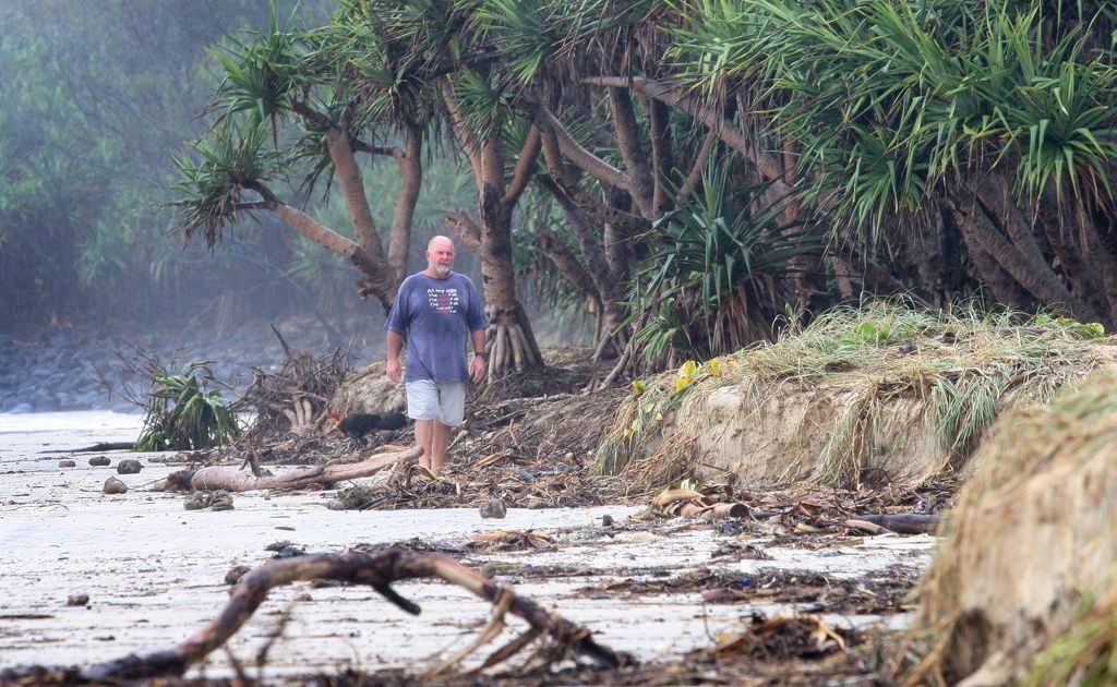 Allen Wise from Fingal Rovers surf club checks out the debris and erosion. Allen Wise from Fingal Rovers surf club checks out the debris and erosion.