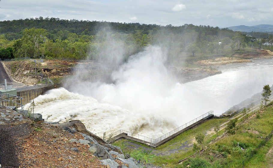 OPEN SEASON: Water is released from the floodgates at Wivenhoe Dam yesterday. OPEN SEASON: Water is released from the floodgates at Wivenhoe Dam yesterday.