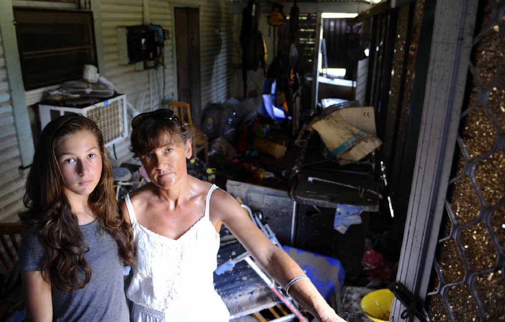 CLEAN START: Leisa and Linda Miles start putting their Copmanhurst home back together after it was completely submerged in floodwaters. Photo: JoJo Newby CLEAN START: Leisa and Linda Miles start putting their Copmanhurst home back together after it was completely submerged in floodwaters. Photo: JoJo Newby