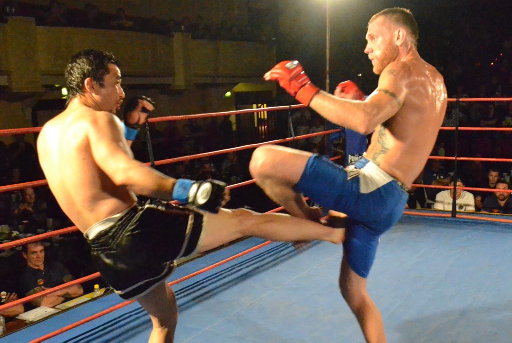 Mixed martial artist Greg Atzori in action against Terry Balboa in Adelaide. Mixed martial artist Greg Atzori in action against Terry Balboa in Adelaide.