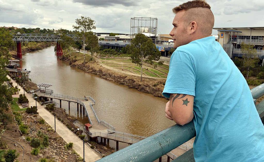 OPEN TO VIEW: Pedestrian Ross Taylor admires the riverside scene from the uncaged David Trumpy Bridge. OPEN TO VIEW: Pedestrian Ross Taylor admires the riverside scene from the uncaged David Trumpy Bridge.