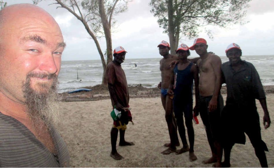 Craig Hand with some friendly PNG villagers prior to his run-in with pirates. Craig Hand with some friendly PNG villagers prior to his run-in with pirates.