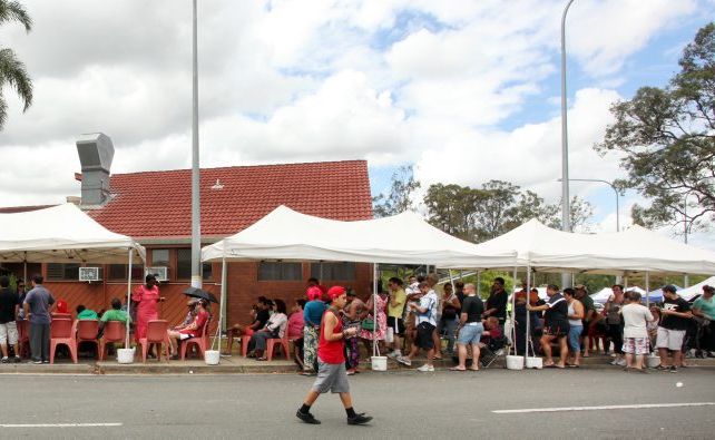 Part of the line-up of people at Logan Central waiting to have emergency assistance grants to be processed. Photo: Inga Williams / The Reporter Part of the line-up of people at Logan Central waiting to have emergency assistance grants to be processed. Photo: Inga Williams / The Reporter