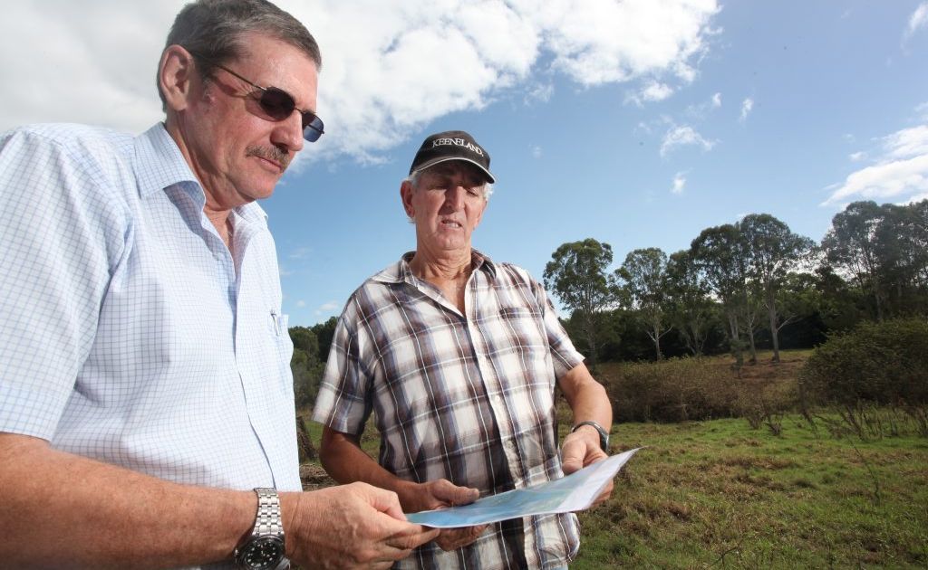 Paul Casbolt and Peter Jenkyn on his property at Logan Reserve where new power lines have been proposed. Photo: Inga Williams / The Reporter Paul Casbolt and Peter Jenkyn on his property at Logan Reserve where new power lines have been proposed. Photo: Inga Williams / The Reporter