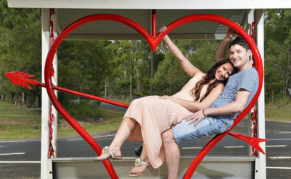 REAL ROMANTICS: Brooke Searle and Matt Breed at the Lovers Lane bus stop at Ironbark. REAL ROMANTICS: Brooke Searle and Matt Breed at the Lovers Lane bus stop at Ironbark.