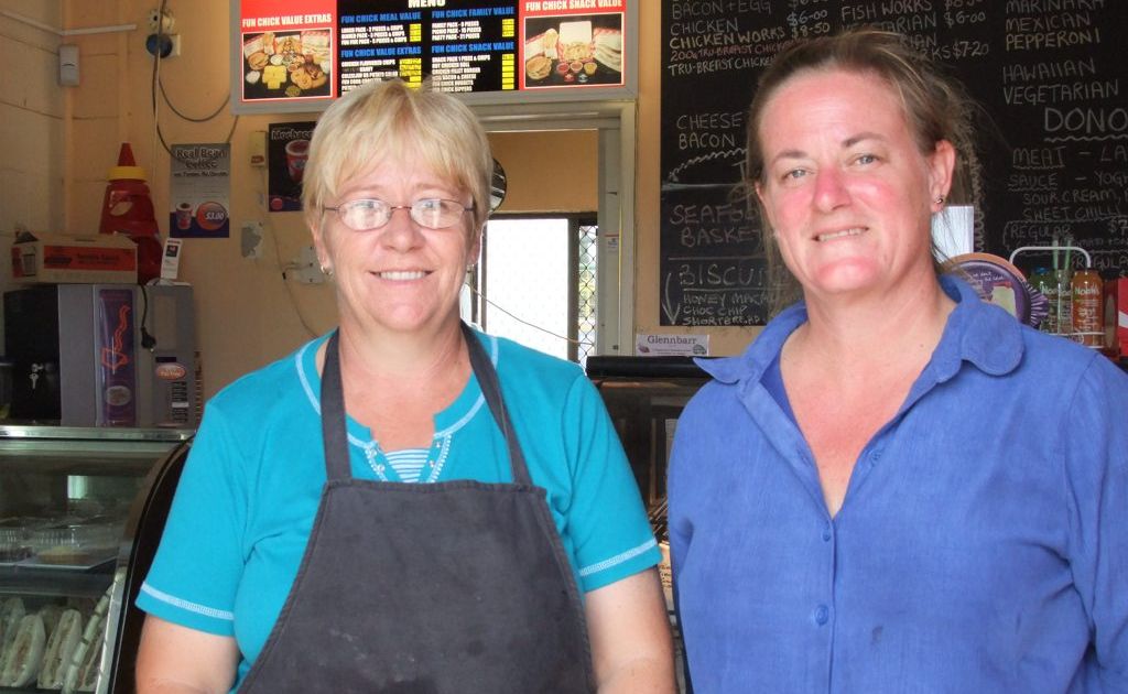 BACK IN BUSINESS: Those who thought Hester Moore (right) wouldn't re-open underestimated her toughness. Helping her through the massive clean-up was staff member Lyndal Summers. BACK IN BUSINESS: Those who thought Hester Moore (right) wouldn't re-open underestimated her toughness. Helping her through the massive clean-up was staff member Lyndal Summers.