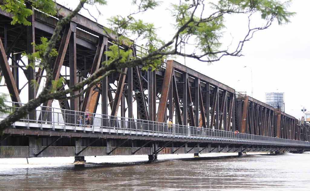 Floodwater runs high under the Grafton Bridge. Photo: JoJo Newby Floodwater runs high under the Grafton Bridge. Photo: JoJo Newby