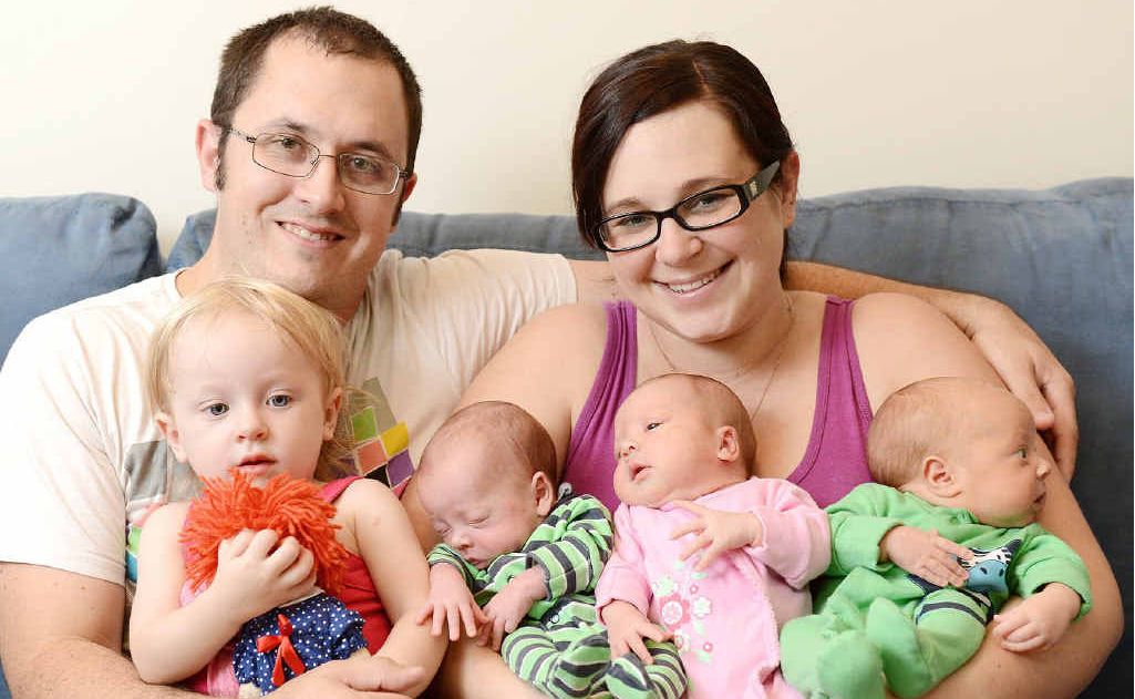 NEW ADDITIONS: Ipswich couple Michelle and Cameron Duncan at the Ipswich Hospital with their naturally conceived triplets, Sebastian, Violet and Max, born at 34 weeks, and their 19-month-old daughter Isabel. NEW ADDITIONS: Ipswich couple Michelle and Cameron Duncan at the Ipswich Hospital with their naturally conceived triplets, Sebastian, Violet and Max, born at 34 weeks, and their 19-month-old daughter Isabel.