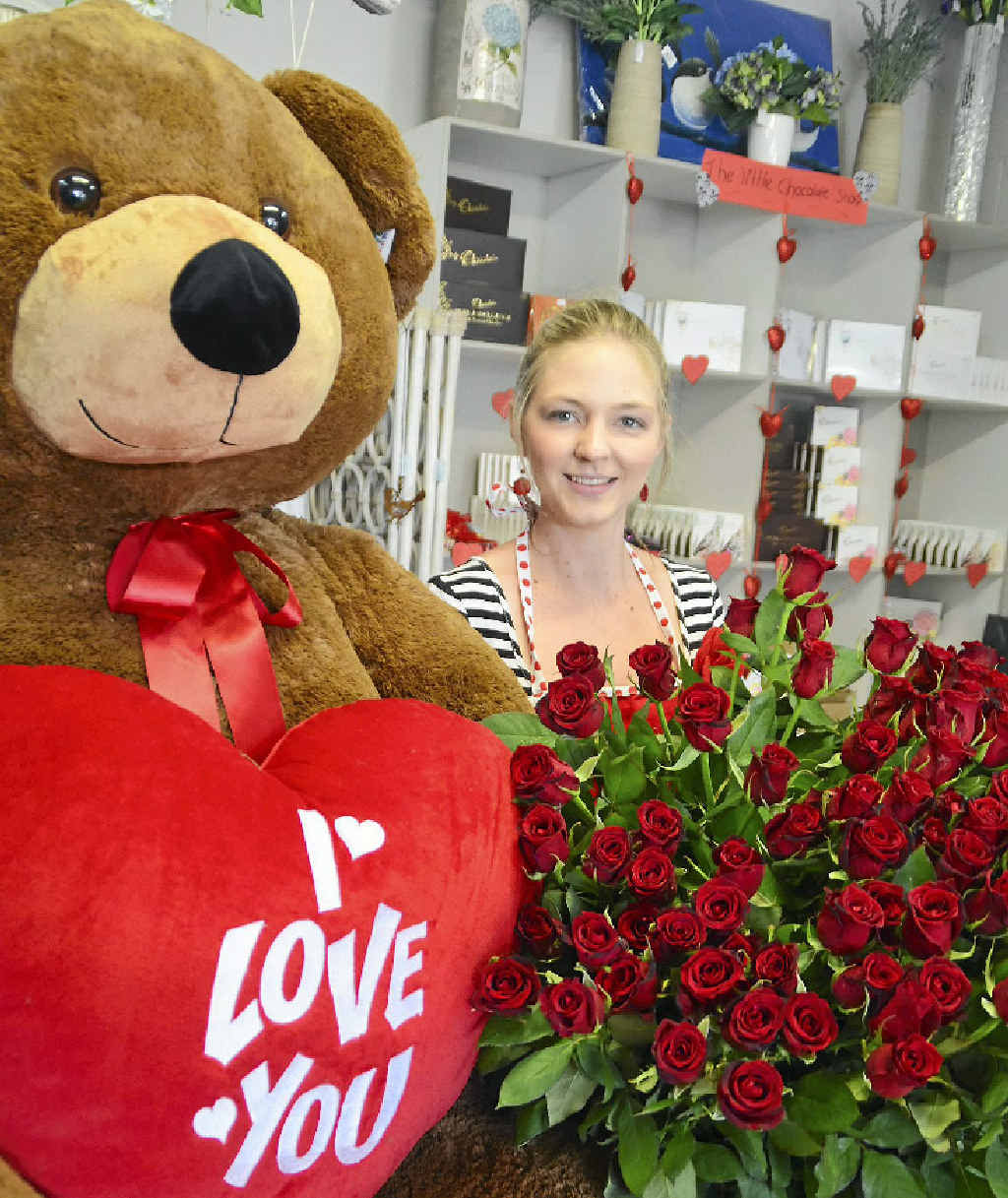 SURROUNDED BY LOVE: Carmen Maguire has her hands full this Valentine’s Day at Emerald’s Blissful Blooms Florist. SURROUNDED BY LOVE: Carmen Maguire has her hands full this Valentine’s Day at Emerald’s Blissful Blooms Florist.