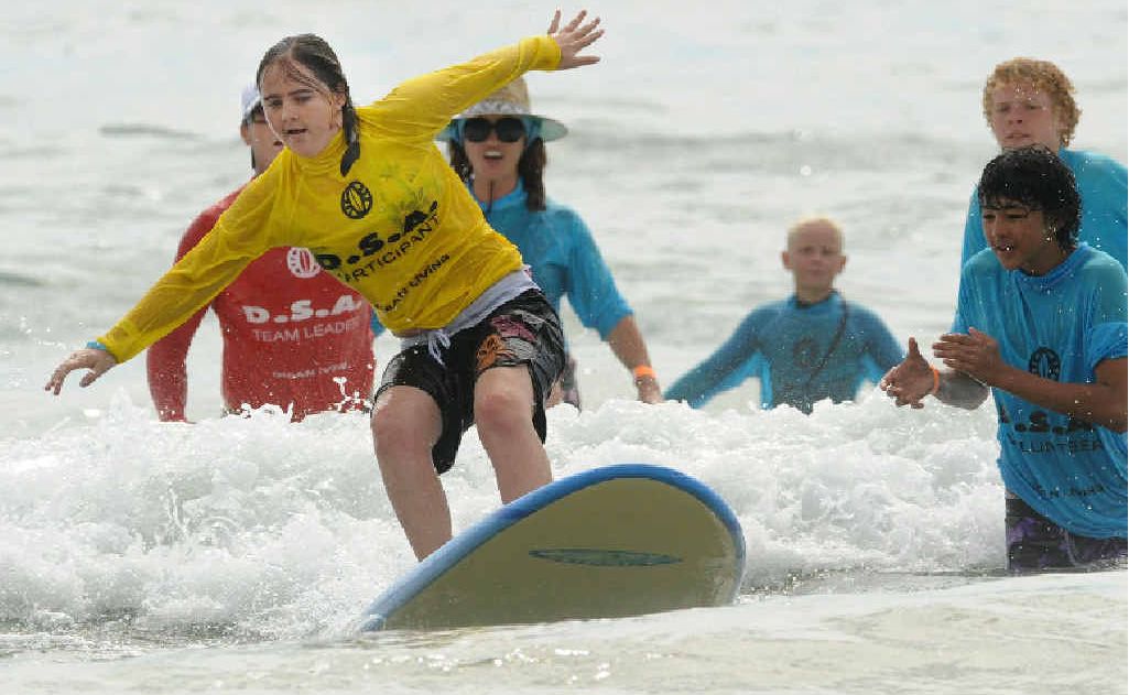 Sarah Hure of Grafton has a great time with the Disabled Surfers Association Far North Coast Surfers at Minnie Water. Sarah Hure of Grafton has a great time with the Disabled Surfers Association Far North Coast Surfers at Minnie Water.
