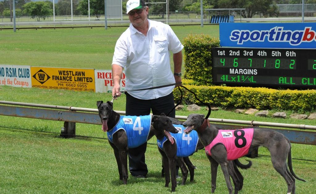 Murwillumbah trainer Jimmy Madigan with his three winners at Casino in February, 2013. Murwillumbah trainer Jimmy Madigan with his three winners at Casino in February, 2013.