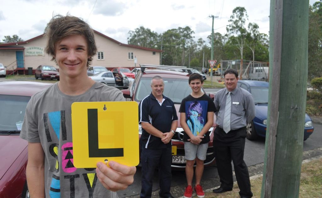 LIFE LESSONS: Students John Duncan and Ryan Thoday are taking part in the BRAKE school education driving course. Also pictured is Sergeant Rob Duncan from the Jimboomba Police Station and Browns Plains Bendigo Bank manager Scott Northfield. Photo: Ashleigh Howarth / The Reporter LIFE LESSONS: Students John Duncan and Ryan Thoday are taking part in the BRAKE school education driving course. Also pictured is Sergeant Rob Duncan from the Jimboomba Police Station and Browns Plains Bendigo Bank manager Scott Northfield. Photo: Ashleigh Howarth / The Reporter