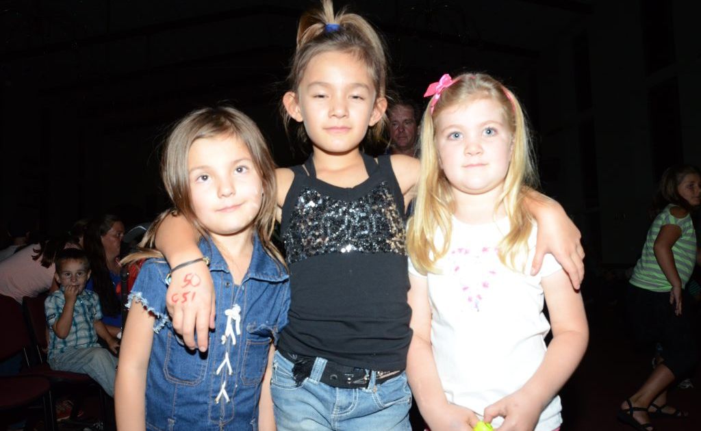 BLUE LIGHT ROCKIN': Sisters Tiarna and Kamorl Petersen got into the spirit of the Kingaroy blue light disco with good friend Bell Freeman. BLUE LIGHT ROCKIN': Sisters Tiarna and Kamorl Petersen got into the spirit of the Kingaroy blue light disco with good friend Bell Freeman.