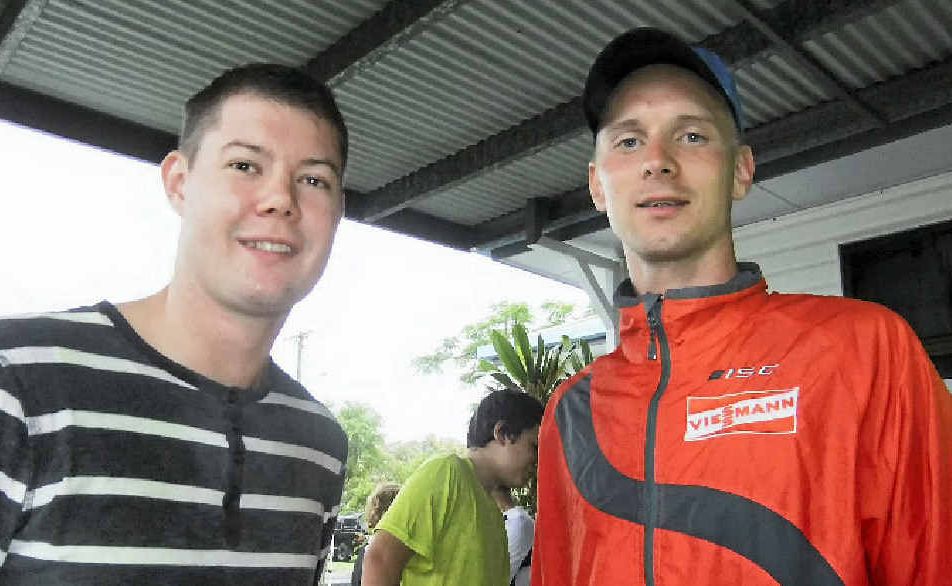 Estonian Winter Olympics contender Karel Viigipuu, right, and Mackay triathlete Nicholas Johns were not deterred by the rain for a 10km run. Estonian Winter Olympics contender Karel Viigipuu, right, and Mackay triathlete Nicholas Johns were not deterred by the rain for a 10km run.