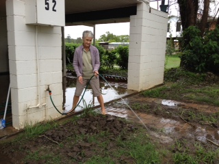 A Brushgrove resident tries to hose out her property after all the rain yesterday. A Brushgrove resident tries to hose out her property after all the rain yesterday.