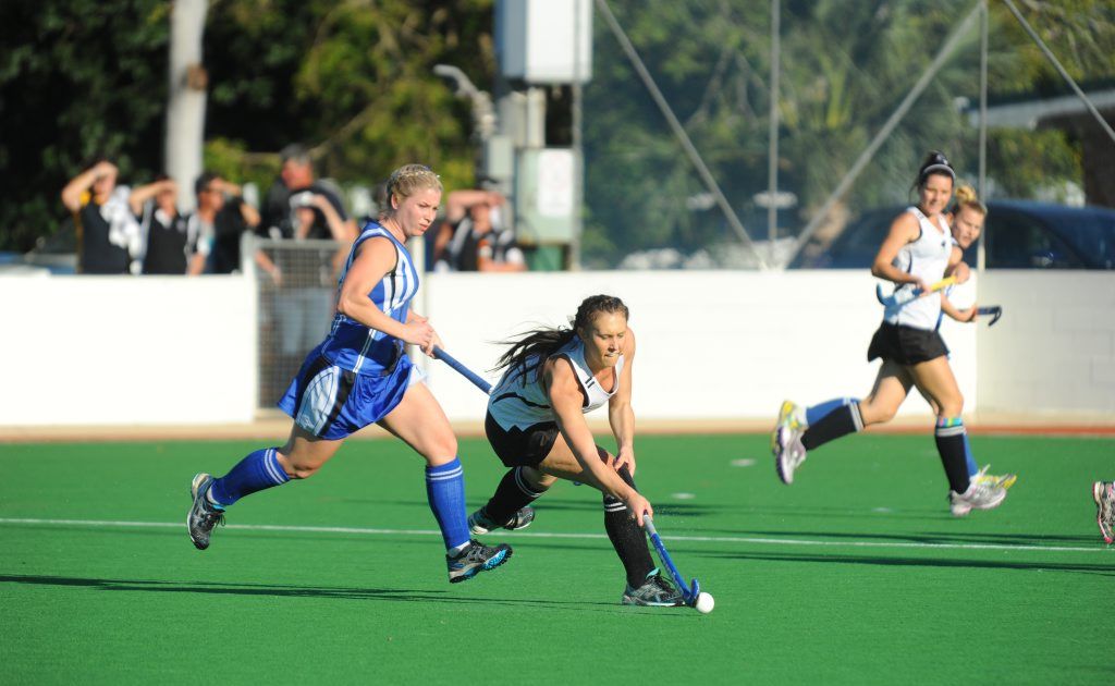 LADIES FINAL: All Blacks' Stacey Neller passes the ball as Cities' Emily Robinson looks on. Photo: Mike Knott / NewsMail LADIES FINAL: All Blacks' Stacey Neller passes the ball as Cities' Emily Robinson looks on. Photo: Mike Knott / NewsMail