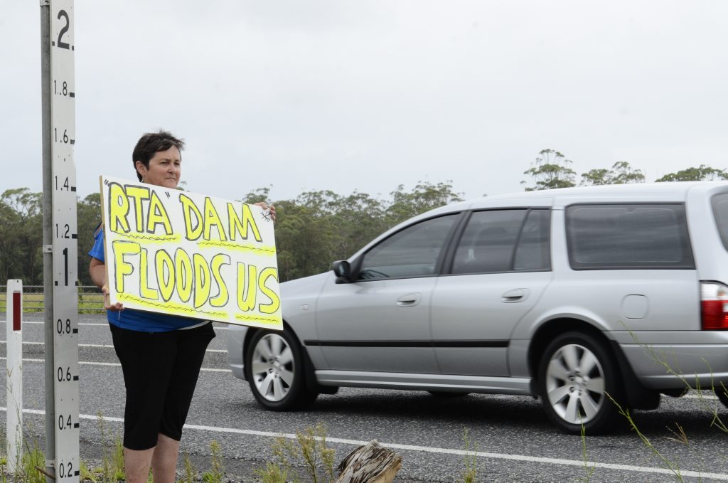 Unhappy Corindi Park resident Jill Mitchell met on the Pacific Highway at Blackadder Creek on Monday with the RMS to voice there concerns regarding the imapct of two floods on their properties. Photo Debrah Novak / The Daily Examiner Unhappy Corindi Park resident Jill Mitchell met on the Pacific Highway at Blackadder Creek on Monday with the RMS to voice there concerns regarding the imapct of two floods on their properties. Photo Debrah Novak / The Daily Examiner
