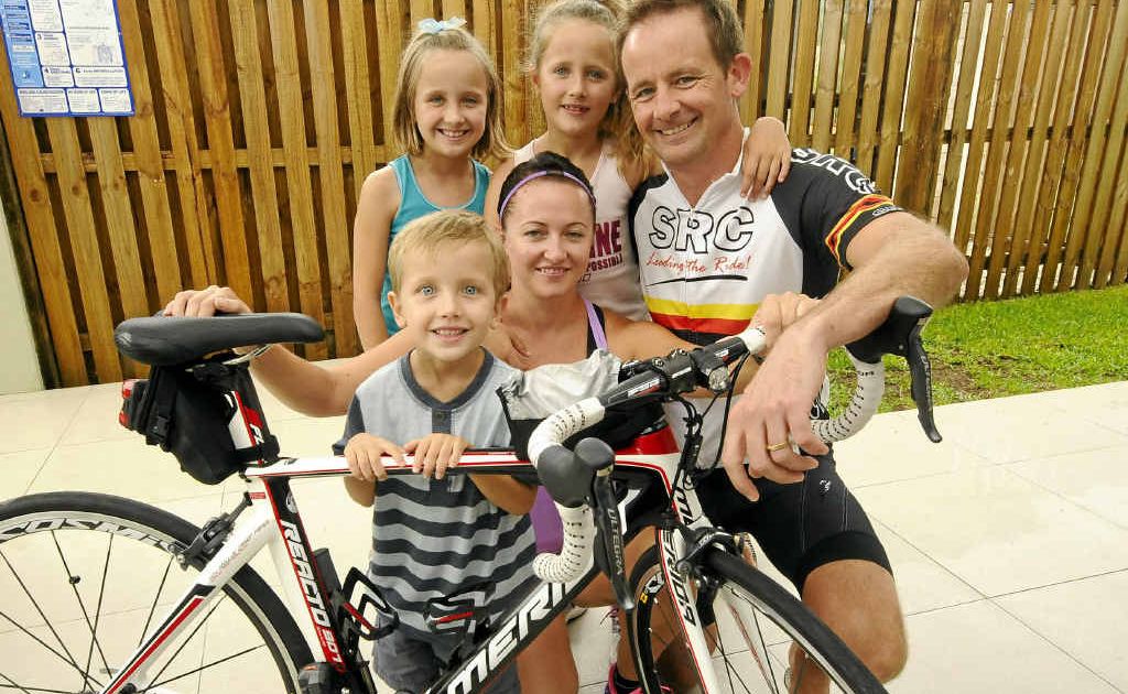 FAMILY SUPPORT: Triathletes Chris and Teresa Barnes with their children Ella, 9, Grace, 7, and Henry, 4. Photo: Doug Eaton FAMILY SUPPORT: Triathletes Chris and Teresa Barnes with their children Ella, 9, Grace, 7, and Henry, 4. Photo: Doug Eaton