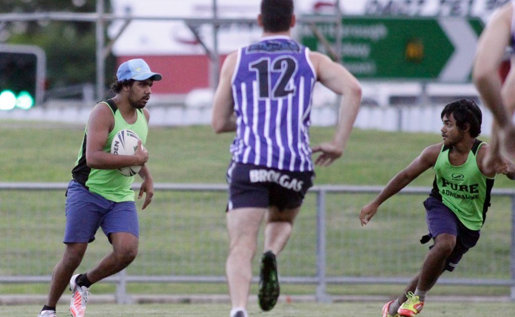 Darumbal player Michael Ray (left) during the Police v Darumbal youth touch football game. Photo: Chris Ison / The Morning Bulletin Darumbal player Michael Ray (left) during the Police v Darumbal youth touch football game. Photo: Chris Ison / The Morning Bulletin