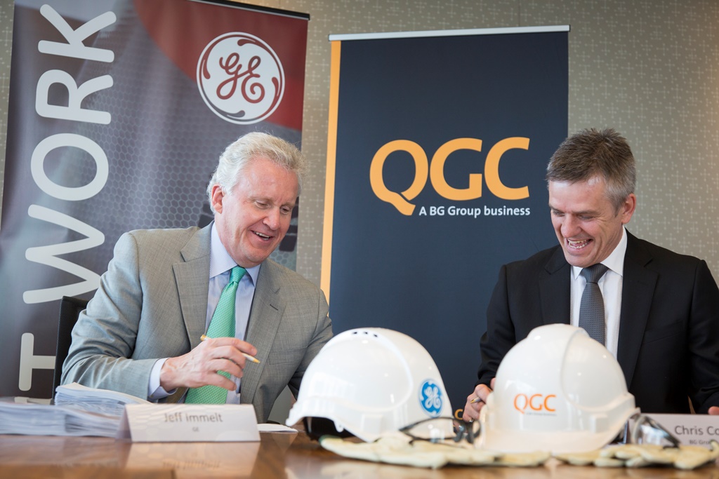 GE chairman and CEO Jeff Immelt (left) and BG Group acting executive vice president BG Advance Chris Cox sign a US$620 million maintenance contract for turbines and other equipment at the QCLNG plant on Curtis Island. GE chairman and CEO Jeff Immelt (left) and BG Group acting executive vice president BG Advance Chris Cox sign a US$620 million maintenance contract for turbines and other equipment at the QCLNG plant on Curtis Island.
