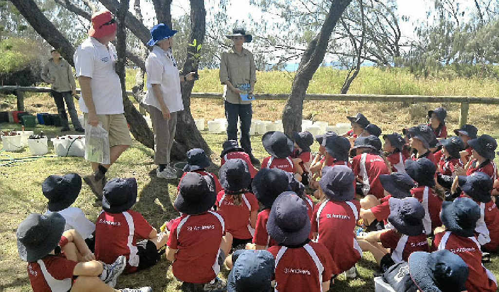 GREEN ARMY: Year 3 St Andrew’s students prepare to plant more than 500 native species on Peregian’s foreshore. GREEN ARMY: Year 3 St Andrew’s students prepare to plant more than 500 native species on Peregian’s foreshore.