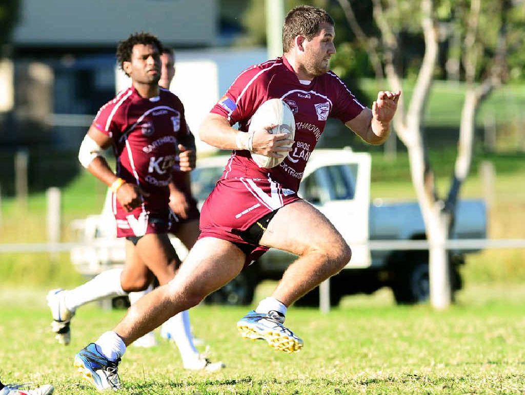 BREAKTHROUGH WIN: Fassifern coach Daniel Roos on the charge in his team’s 14-8 win over Goodna a yesterday, with influential halfback Kali Nauqe in support. BREAKTHROUGH WIN: Fassifern coach Daniel Roos on the charge in his team’s 14-8 win over Goodna a yesterday, with influential halfback Kali Nauqe in support.