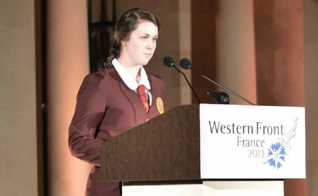 FAULTLESS: McCauley Catholic College student Caitlin Nash reads the Ode of Remembrance at Menin Gate. FAULTLESS: McCauley Catholic College student Caitlin Nash reads the Ode of Remembrance at Menin Gate.