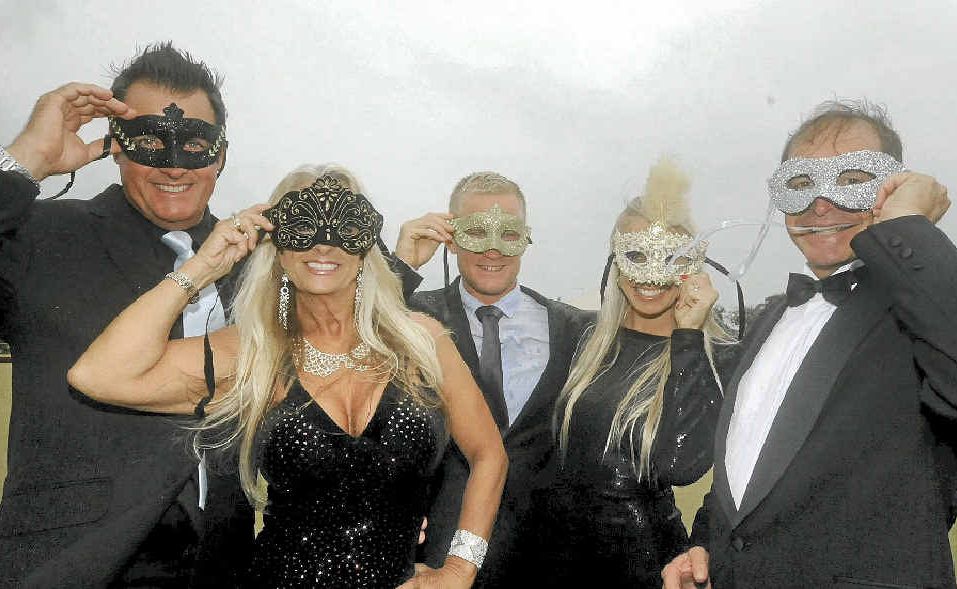 MASQUERADE BALL: James Armstrong, Tracey Everingham, pro surfer Adam Melling, Jaymin Perkins and Pip Carter ready for a fundraising ball. MASQUERADE BALL: James Armstrong, Tracey Everingham, pro surfer Adam Melling, Jaymin Perkins and Pip Carter ready for a fundraising ball.