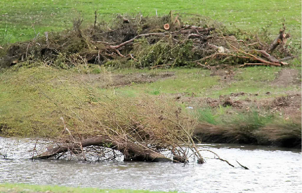 Trees have been removed from the banks of the river. Trees have been removed from the banks of the river.