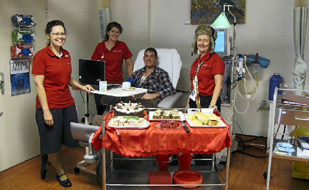 Patient Trevor Roberts with clinical nurse Alison Kernan, nurse unit manager Julie McRae and clinical nurse Trish Gilroy. Patient Trevor Roberts with clinical nurse Alison Kernan, nurse unit manager Julie McRae and clinical nurse Trish Gilroy.