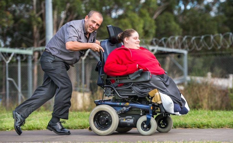 FUND RAISER: Ken Hoad will be pushing a wheel chair from Urunga to Coffs to raise funds for his sister Emma. Photo: Trevor Veale / The Coffs Coast Advocate FUND RAISER: Ken Hoad will be pushing a wheel chair from Urunga to Coffs to raise funds for his sister Emma. Photo: Trevor Veale / The Coffs Coast Advocate