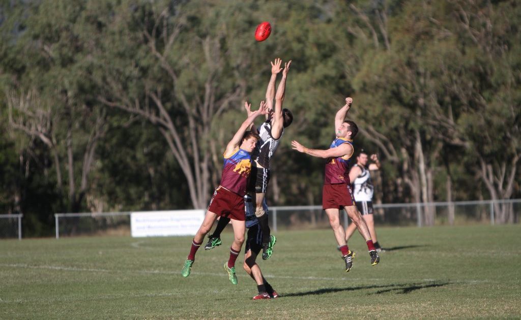 Glenmores James Murphy tries to punch the ball. Photo Allan Reinikka / The Morning Bulletin Glenmores James Murphy tries to punch the ball. Photo Allan Reinikka / The Morning Bulletin