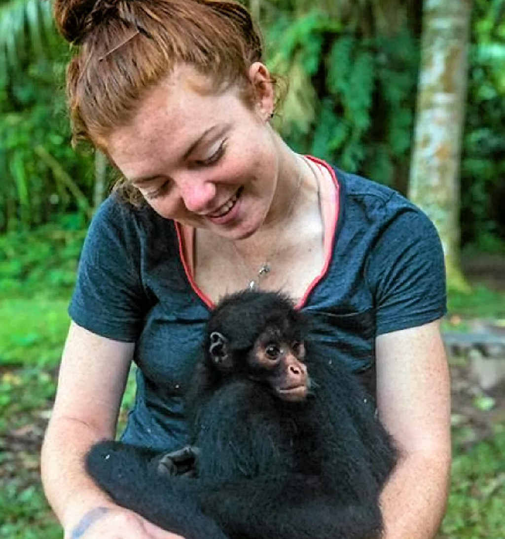 DREAM LIFE: Emma Perrin, pictured travelling through the Amazon, works on the Southern Great Barrier Reef. DREAM LIFE: Emma Perrin, pictured travelling through the Amazon, works on the Southern Great Barrier Reef.