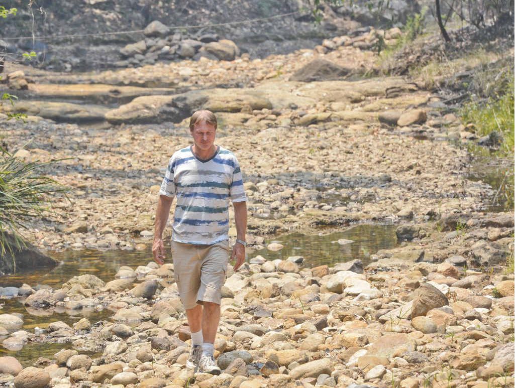 NO TRICKLE DOWN EFFECT: Manager of the Nymboida Canoe Centre Rob Delderfield walks along the dry upstream section of Goolang Creek. NO TRICKLE DOWN EFFECT: Manager of the Nymboida Canoe Centre Rob Delderfield walks along the dry upstream section of Goolang Creek.