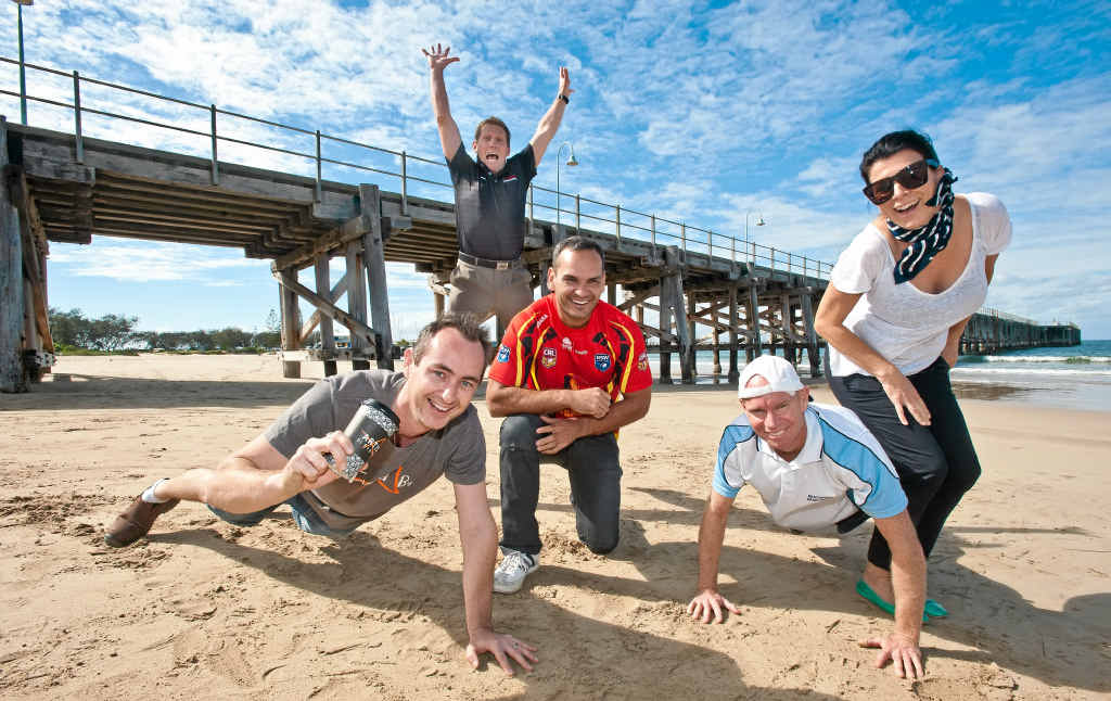 ON TRACK: Anthony Donovan (kneeling) joins supporters Luke Floyd, Rob Hoy, Michael Dougherty and Nicole Donovan in a workout on Jetty Beach. Rob Wright ON TRACK: Anthony Donovan (kneeling) joins supporters Luke Floyd, Rob Hoy, Michael Dougherty and Nicole Donovan in a workout on Jetty Beach. Rob Wright