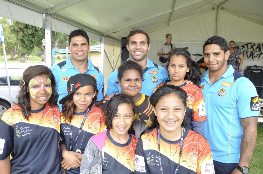 Gold Coast Titans players (from left) Brad Tighe, Maurice Blair and Albert Kelly enjoy the Carbal Family Fun Day with (from left) Rayleigh Colliss, Crystal Weatherall, Tayla Comer, Caitlin Lingwoodock, Liryc Comer and Alisha Wight. Gold Coast Titans players (from left) Brad Tighe, Maurice Blair and Albert Kelly enjoy the Carbal Family Fun Day with (from left) Rayleigh Colliss, Crystal Weatherall, Tayla Comer, Caitlin Lingwoodock, Liryc Comer and Alisha Wight.