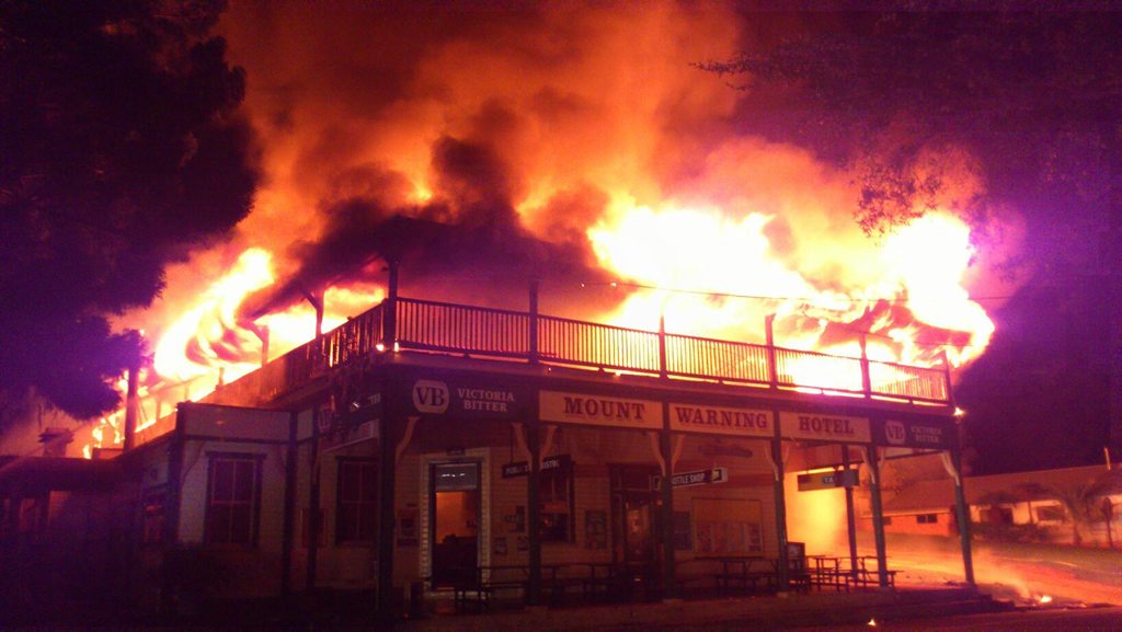 Paul Robertson posted this photo on Facebook of the historic Mt Warning Hotel, at Uki, going up in flames on February 23. Paul Robertson posted this photo on Facebook of the historic Mt Warning Hotel, at Uki, going up in flames on February 23.