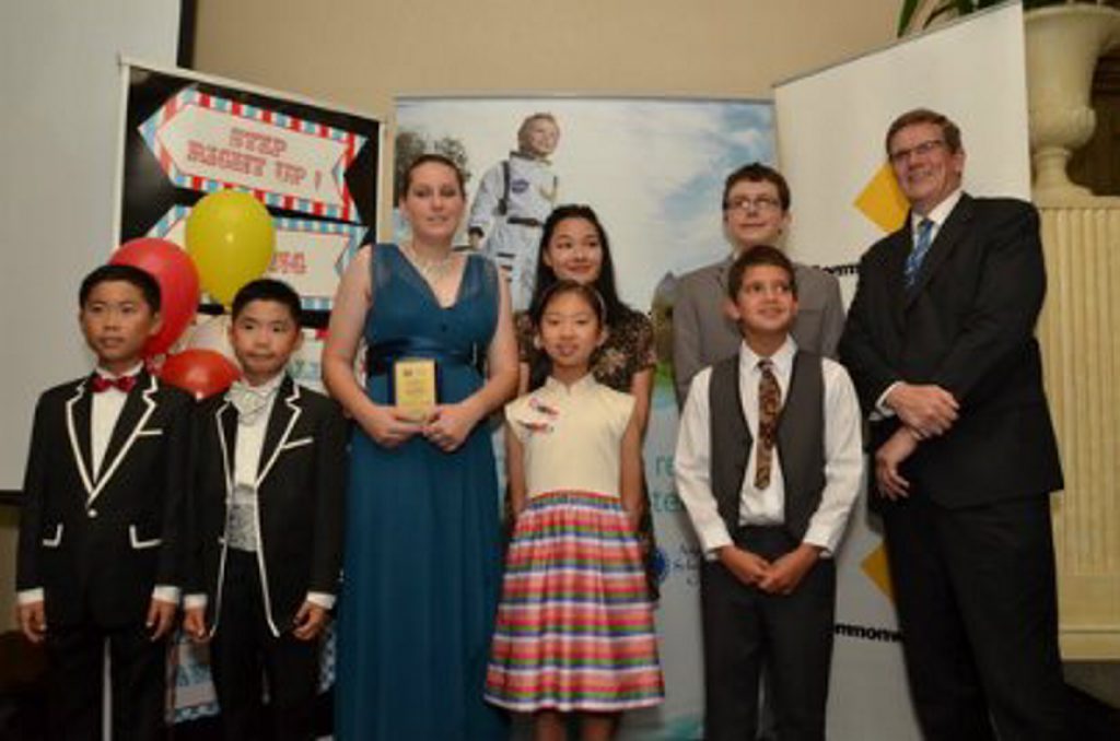 Tanah Merah's Rebecca Campbell with her award Front Row: L to R: Andrew Yang, Eric Yang, Rebecca Campbell, Ashley Dhanu and Keiren Waters. Back Row: L to R: Evangeline Yong, Peter Bakos and ASG Chief Operating Officer, Bruce Hawkins. Tanah Merah's Rebecca Campbell with her award Front Row: L to R: Andrew Yang, Eric Yang, Rebecca Campbell, Ashley Dhanu and Keiren Waters. Back Row: L to R: Evangeline Yong, Peter Bakos and ASG Chief Operating Officer, Bruce Hawkins.