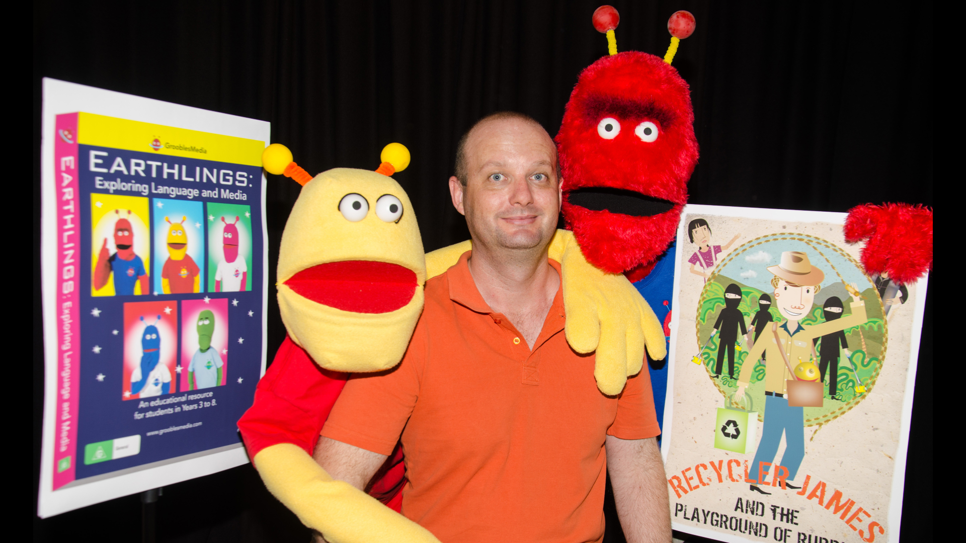 Jim Hancock with puppet aliens Milton and Harvey. Jim Hancock with puppet aliens Milton and Harvey.