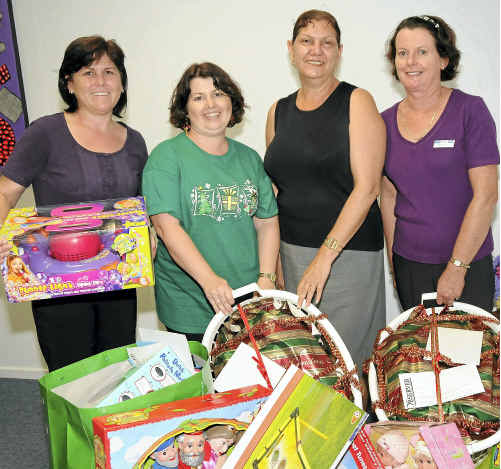 Leanne Montgomery, Diane Trevorton (The Observer), Valerie Dempsey and Wendy Mannell from Lifeline with items for Adopt-a-Family. Leanne Montgomery, Diane Trevorton (The Observer), Valerie Dempsey and Wendy Mannell from Lifeline with items for Adopt-a-Family.