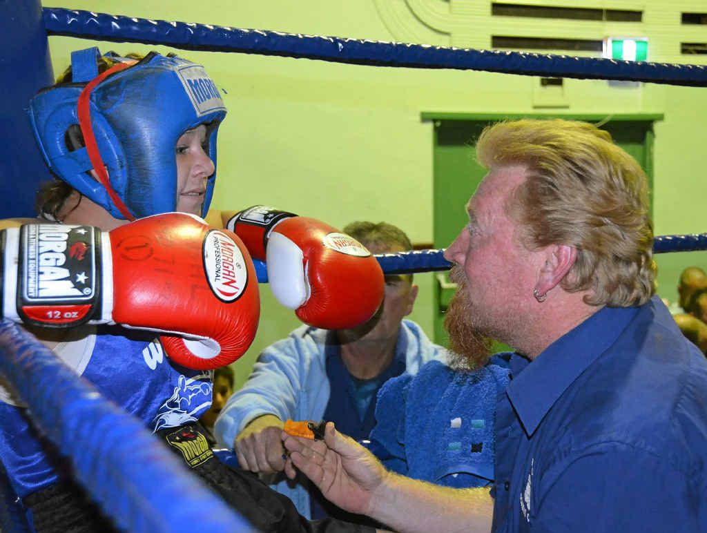 Kaitlin Stagg receives some advice in her corner from trainer Rodd Parry. Kaitlin Stagg receives some advice in her corner from trainer Rodd Parry.