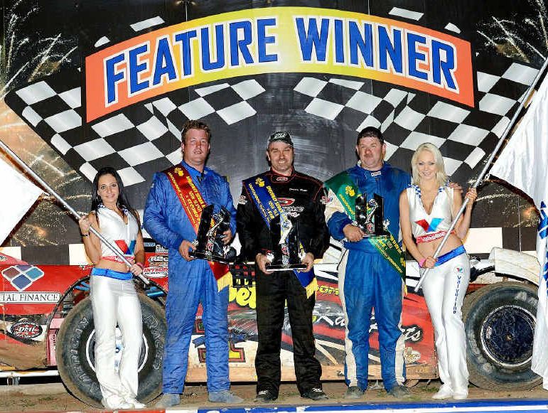 PRIZE POSITION: Ipswich driver Darren Kane (middle) is flanked by NSW championships placegetters Lachlan Onley (left) and Dave Gartner after his latest title success. PRIZE POSITION: Ipswich driver Darren Kane (middle) is flanked by NSW championships placegetters Lachlan Onley (left) and Dave Gartner after his latest title success.